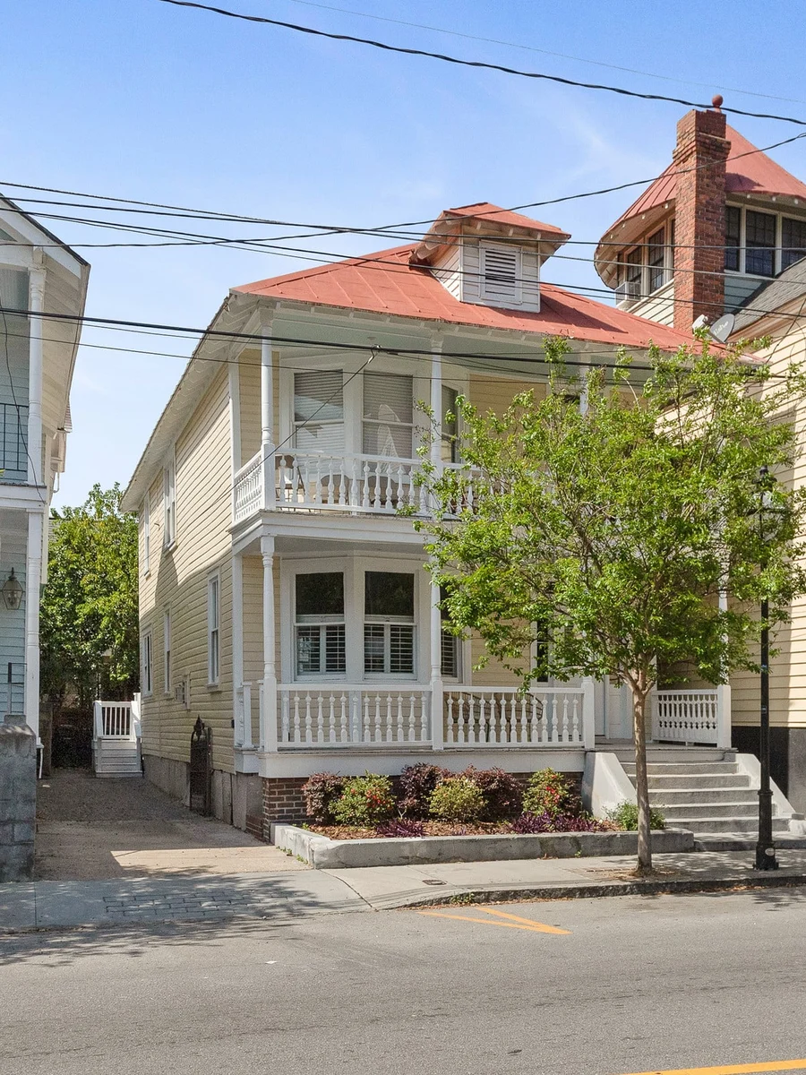 The front porch and red tin roof of The Sundance Residence on Spring Street